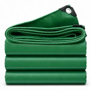 Bâche PVC verte sur mesure pliée avec œillet de fixation