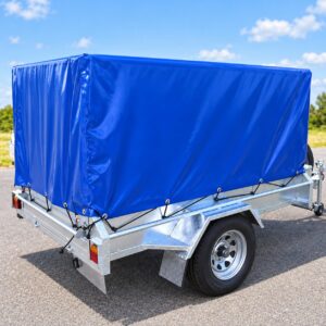 Remorque équipée d'une bâche PVC bleue sur mesure